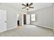 Bedroom with carpet and plenty of natural light from the windows at 2801 E Southport Rd, Indianapolis, IN 46227