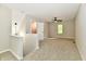 Bright bedroom with neutral paint, carpet, ceiling fan, and natural light from a window at 2801 E Southport Rd, Indianapolis, IN 46227