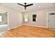 Spacious and well-lit living room with luxury vinyl flooring and contemporary design at 2801 E Southport Rd, Indianapolis, IN 46227