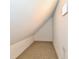 Small storage area with carpet and a light fixture at 2801 E Southport Rd, Indianapolis, IN 46227