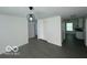 Open living area featuring luxury vinyl plank flooring and a seamless flow into the modern kitchen at 2930 N Rural St, Indianapolis, IN 46218