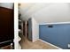 Attic hallway with shelving and access to additional storage space at 313 N 16Th Ave, Beech Grove, IN 46107