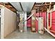 Unfinished basement featuring utilities, ductwork, and concrete flooring at 313 N 16Th Ave, Beech Grove, IN 46107