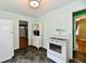 Bright kitchen featuring white appliances, tiled floors, and ample countertop space at 313 N 16Th Ave, Beech Grove, IN 46107
