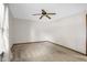 A bright bedroom with neutral carpeting and a ceiling fan at 3235 Flintwood Dr, Columbus, IN 47203