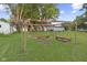 Backyard includes a fire pit with bench seating at 330 S Green St, Brownsburg, IN 46112