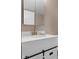 Well-lit bathroom featuring white vanity with modern sink and faucet at 330 S Green St, Brownsburg, IN 46112