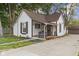 Charming two-story home with a front porch and well-maintained lawn at 330 S Green St, Brownsburg, IN 46112