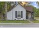 Charming two-story home with a front porch and well-maintained lawn at 330 S Green St, Brownsburg, IN 46112