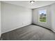 Cozy bedroom with soft carpet, a window offering natural light, and neutral walls at 3445 Brandenburg Blvd, Indianapolis, IN 46239
