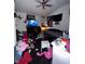 Bedroom with dark vinyl floors at 4607 Melrose Ave, Indianapolis, IN 46241