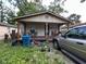 Inviting single-story home with a covered front porch, perfect for enjoying the outdoors at 4607 Melrose Ave, Indianapolis, IN 46241