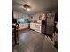 Kitchen featuring a standard refrigerator, and white cabinets at 4607 Melrose Ave, Indianapolis, IN 46241