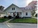 Charming two-story home with a welcoming front porch and well-maintained lawn at 4740 Milton St, Coatesville, IN 46121