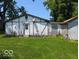 View of the side of a building featuring weathered paneling and trim at 489 W Sumner Ave, Martinsville, IN 46151