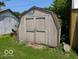 Exterior view of the front of the shed with weathered wood doors at 489 W Sumner Ave, Martinsville, IN 46151