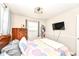 Comfortable bedroom featuring neutral walls and natural light, with accents for character at 504 Broadway Ave, Arcadia, IN 46030