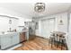 Modern kitchen with stainless steel appliances, stylish countertops, and a cozy breakfast nook at 504 Broadway Ave, Arcadia, IN 46030