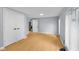 Bedroom view with light colored floors, light gray walls, an open doorway, and a closet at 533 Patterson Rd, Columbus, IN 47203