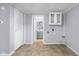 Laundry room offers gray walls, a door to the bathroom, and a cabinet at 533 Patterson Rd, Columbus, IN 47203