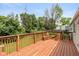 Inviting wood deck featuring wood railings and outdoor seating at 5802 Rymark Ct, Indianapolis, IN 46250