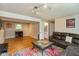 Spacious living room with hardwood floors and a comfortable seating area at 5802 Rymark Ct, Indianapolis, IN 46250