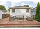 Cozy backyard deck with comfortable outdoor seating and string lights at 6045 Crittenden Ave, Indianapolis, IN 46220