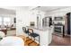 Eat-in kitchen with stainless steel appliances, light gray cabinets and granite countertops at 6045 Crittenden Ave, Indianapolis, IN 46220