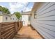 Wooden deck adjacent to the home, fenced on one side, providing an outdoor space at 6045 Crittenden Ave, Indianapolis, IN 46220