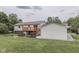 Well-kept backyard featuring a fire pit and deck overlooking the green space at 617 Echo Bend Blvd, Greenwood, IN 46142