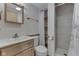 Bathroom with wood vanity, shower, and new toilet at 617 Echo Bend Blvd, Greenwood, IN 46142