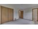 Bedroom featuring a large closet and neutral carpeting at 617 Echo Bend Blvd, Greenwood, IN 46142