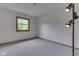 Bedroom featuring neutral carpeting, light walls, and window letting in natural light at 617 Echo Bend Blvd, Greenwood, IN 46142