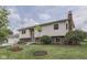 Charming home featuring a brick chimney, complemented by a well-manicured lawn and landscaping at 617 Echo Bend Blvd, Greenwood, IN 46142