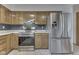 Kitchen featuring stainless steel appliances and oak cabinets at 617 Echo Bend Blvd, Greenwood, IN 46142