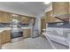 Updated kitchen with stainless steel appliances and gray subway tile backsplash at 617 Echo Bend Blvd, Greenwood, IN 46142