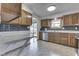 Updated kitchen with stainless steel appliances and gray subway tile backsplash at 617 Echo Bend Blvd, Greenwood, IN 46142
