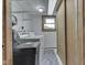 Well-lit laundry room featuring washer, dryer, and ample storage at 617 Echo Bend Blvd, Greenwood, IN 46142