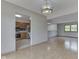 Spacious living room with wood floors connects to the kitchen at 617 Echo Bend Blvd, Greenwood, IN 46142