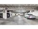 Well-lit parking garage with plenty of parking spaces available at 624 E Walnut St # 48, Indianapolis, IN 46204