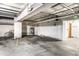 Well-lit parking garage with ample space, storage racks and secure access at 624 E Walnut St # 48, Indianapolis, IN 46204