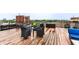 Beautiful rooftop deck offering city views and comfortable lounge furniture at 624 E Walnut St # 48, Indianapolis, IN 46204