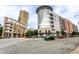 Vibrant street view with modern condo buildings and bustling street scene at 624 E Walnut St # 48, Indianapolis, IN 46204