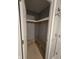 Walk-in closet with ample shelving and storage space at 7307 Barnwell Pl, Indianapolis, IN 46217