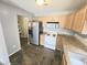 Well-equipped kitchen with appliances, ample counter space, and a convenient layout for cooking at 7307 Barnwell Pl, Indianapolis, IN 46217