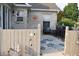 Inviting backyard patio with comfortable seating, stylish rug, and charming decorative touches at 7357 Lake Lakota Dr, Indianapolis, IN 46217