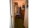 Walk-in closet with ample hanging space, shelving, and storage drawers at 7357 Lake Lakota Dr, Indianapolis, IN 46217