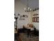 Inviting dining area with stylish decor, shelves, and a cozy built-in bench at 7357 Lake Lakota Dr, Indianapolis, IN 46217