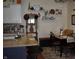 Charming dining area features a breakfast bar, seating and decor shelving at 7357 Lake Lakota Dr, Indianapolis, IN 46217