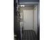 Functional laundry room with modern washer and dryer and stylish floral tiled floors at 7357 Lake Lakota Dr, Indianapolis, IN 46217